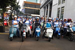 Rayakan HUT ke 32 Jasaraharja Putera Gelar Kegiatan Vespaan Bersama Mitra
